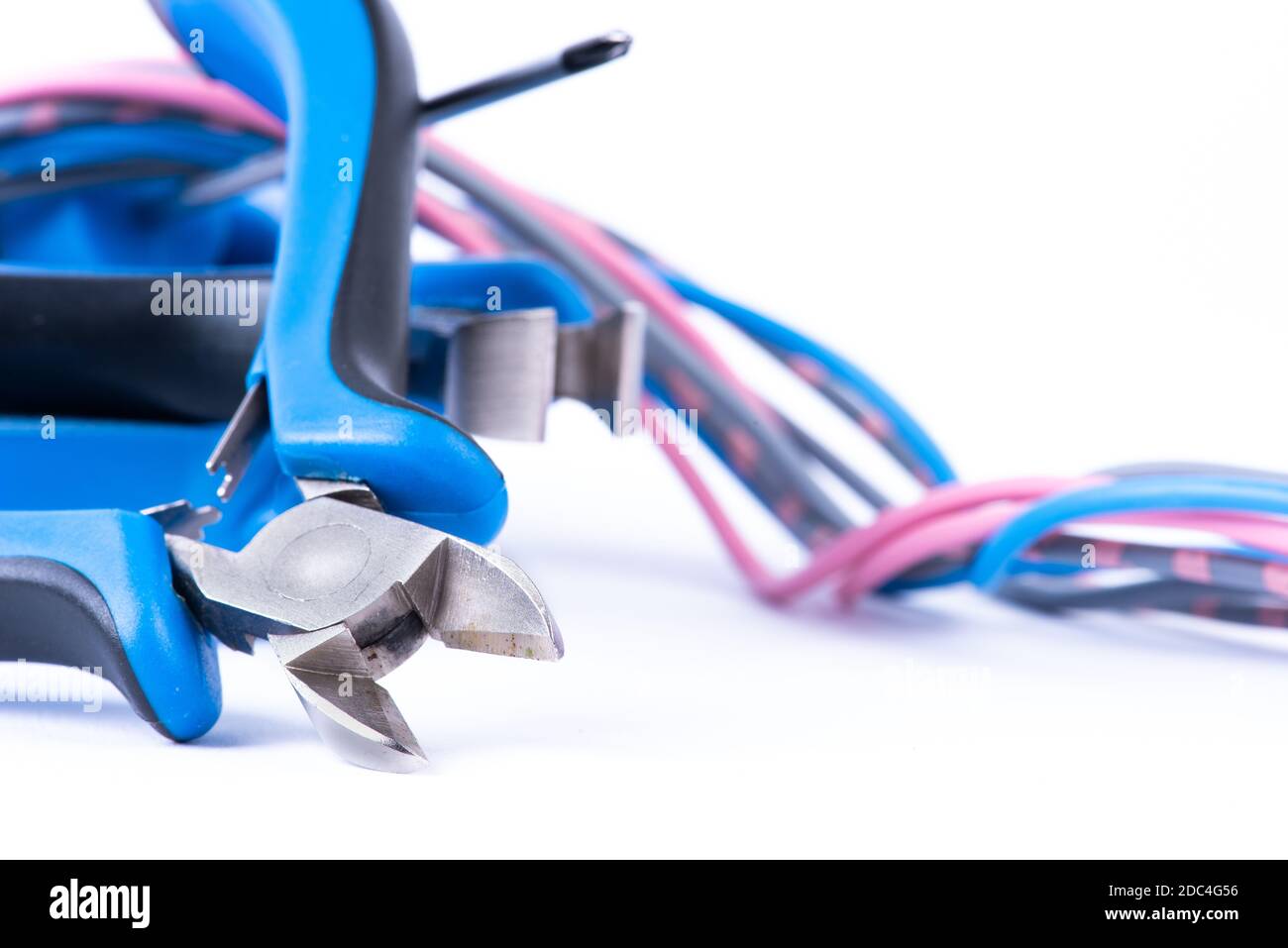 Colorful wiring and tool pliers used in electrical installation