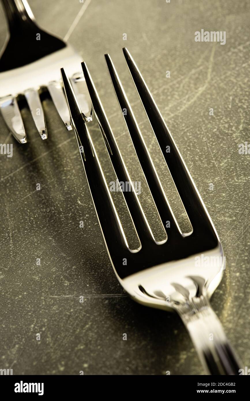 Macro of fork on metallic background Stock Photo