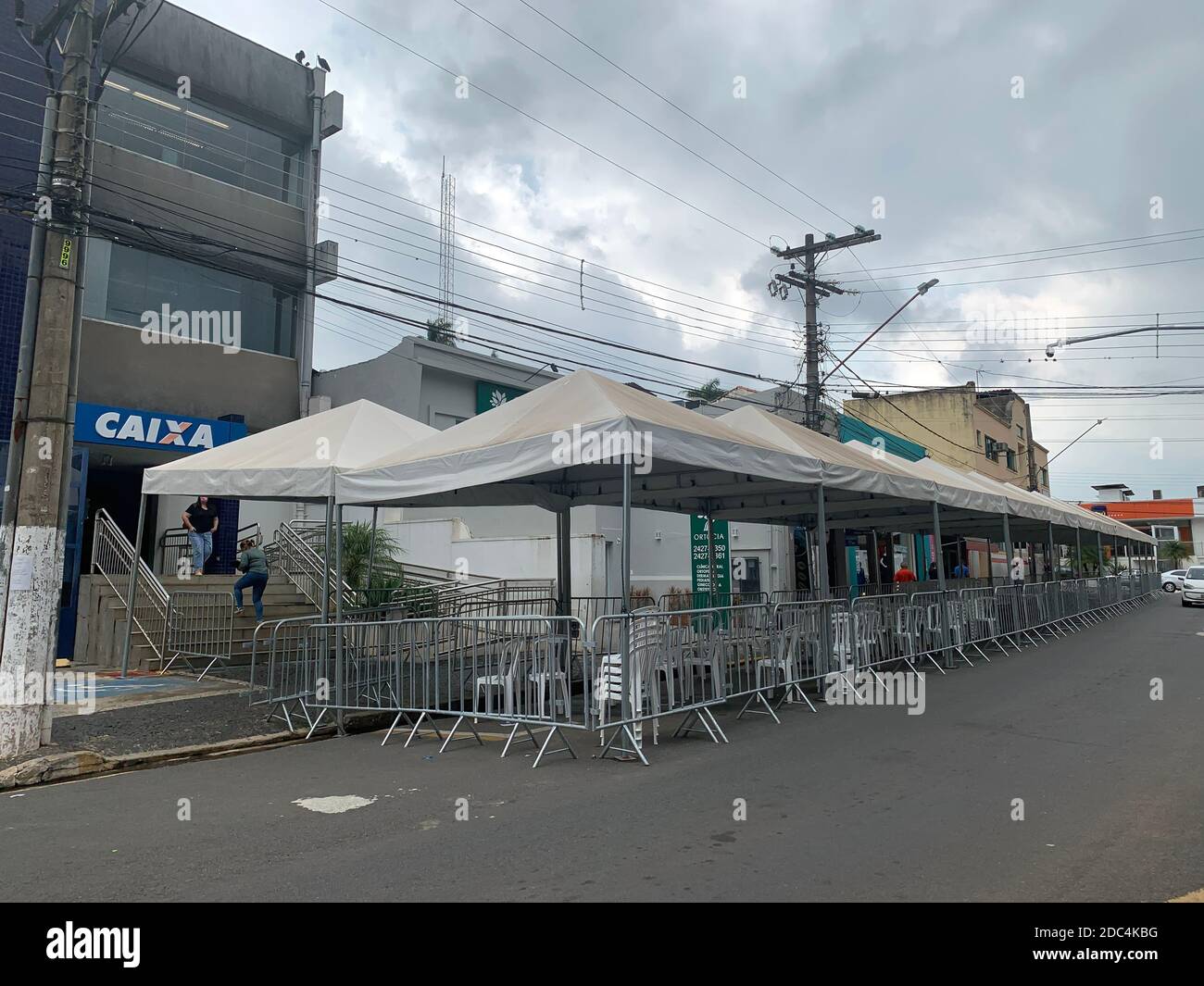 November 17, 2020. Atibaia, SP, Brazil. Metal structure with cover mounted in front of the Caixa Economica federal bank, to welcome people in line wit Stock Photo