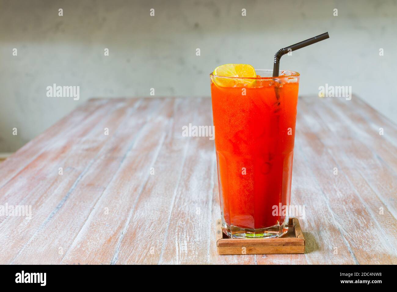 Ice tea glasss with lemon on wooden table background. Stock Photo