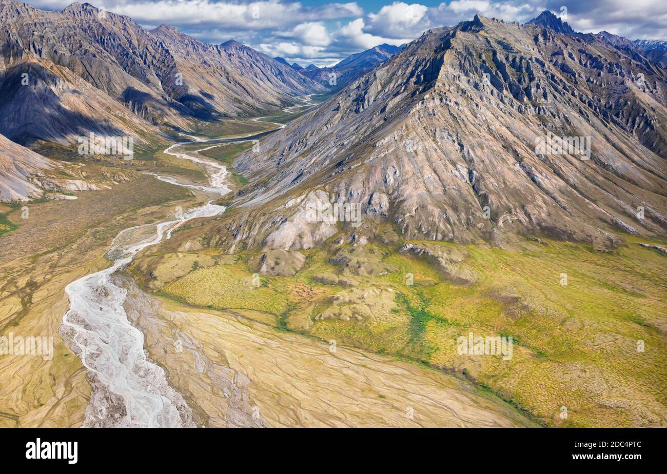 Aerial view of the Brooks Range and tundra in the Arctic National Wildlife Refuge in Northeastern Alaska. The remote Arctic National Wildlife Refuge covers approximately 19.64 million acres of land and is the largest wilderness in the United States. Stock Photo