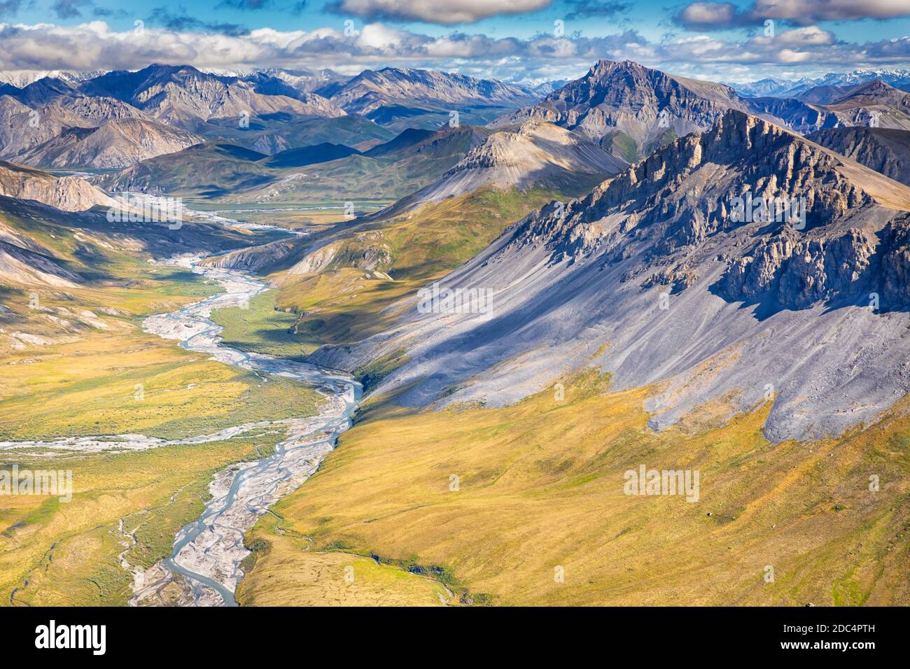 Aerial view of a glacial river valley and the Brooks Range at the 