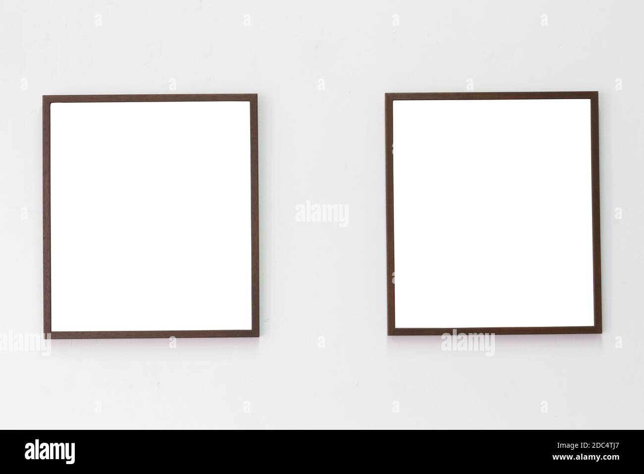 horizontal photo of two photo frame on blank wall background, copyspace