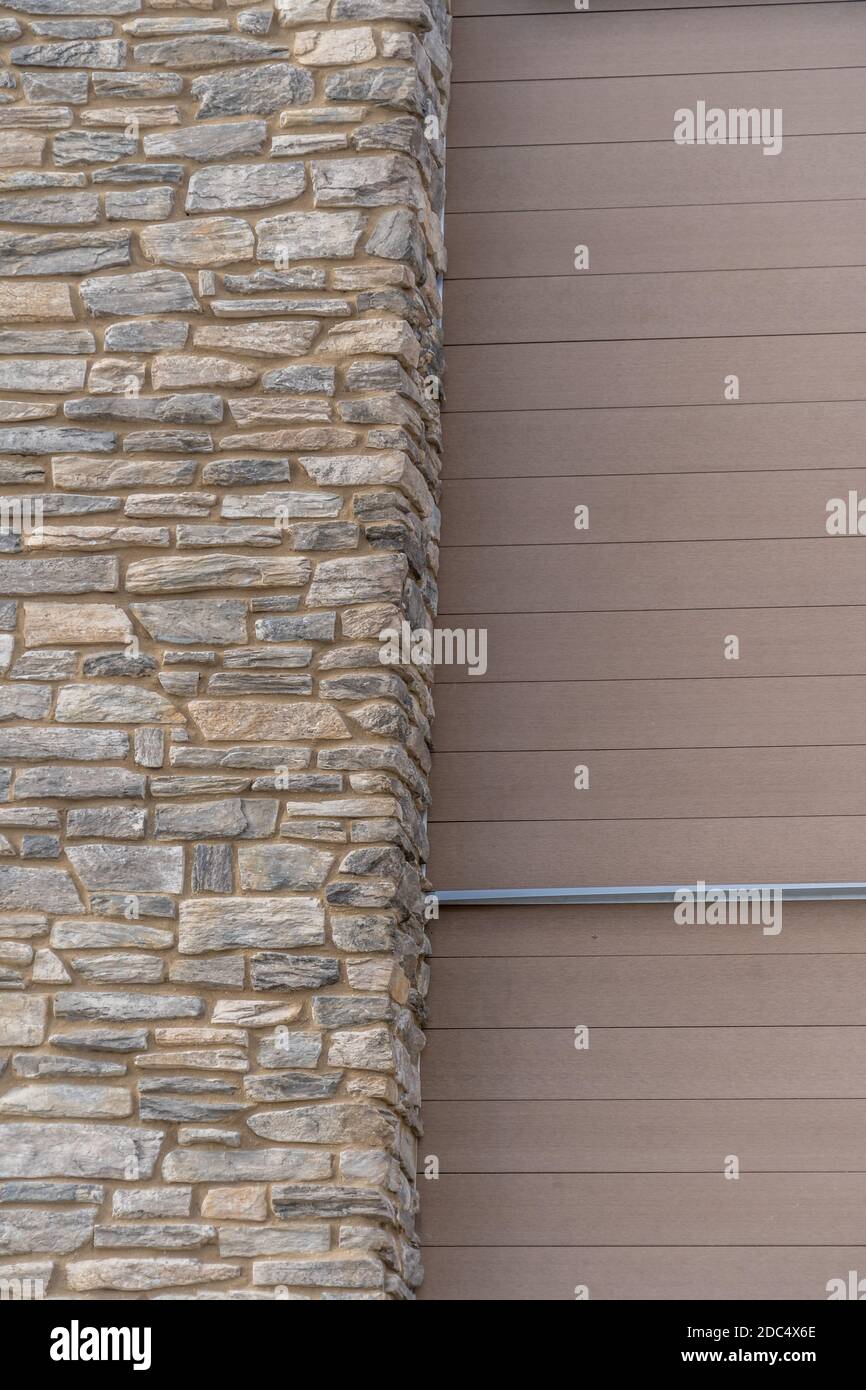 Horizontal decorative stone veneer applied on a wall Stock Photo