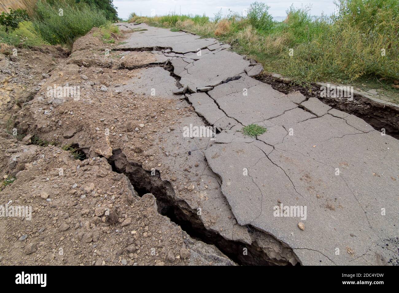 Destroyed Rural Road Road destroyed in phenomenon hi-res stock photography and images - Alamy
