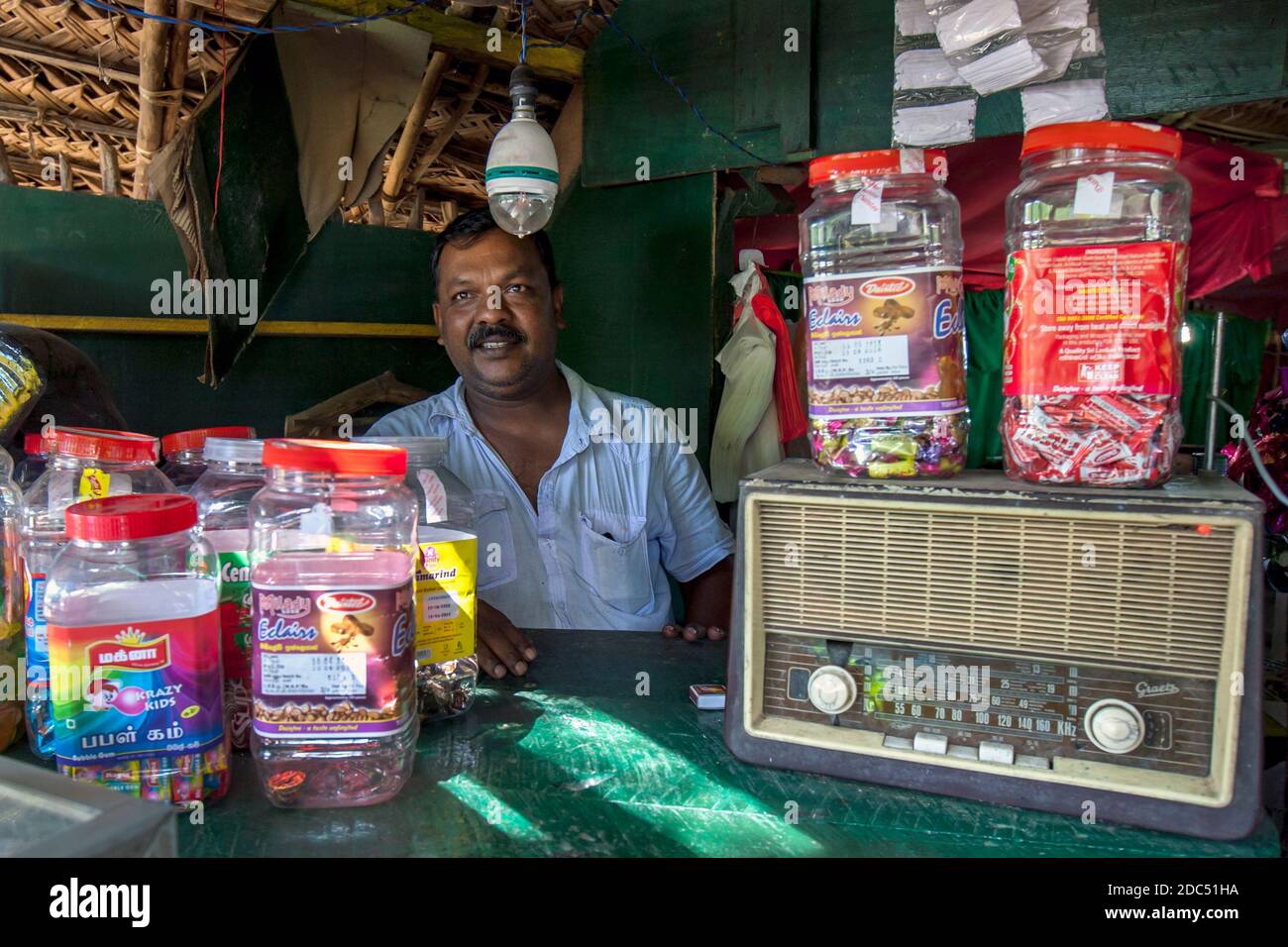 A Sri Lankan shop keeper near Kataragama in Sri Lanka. In the