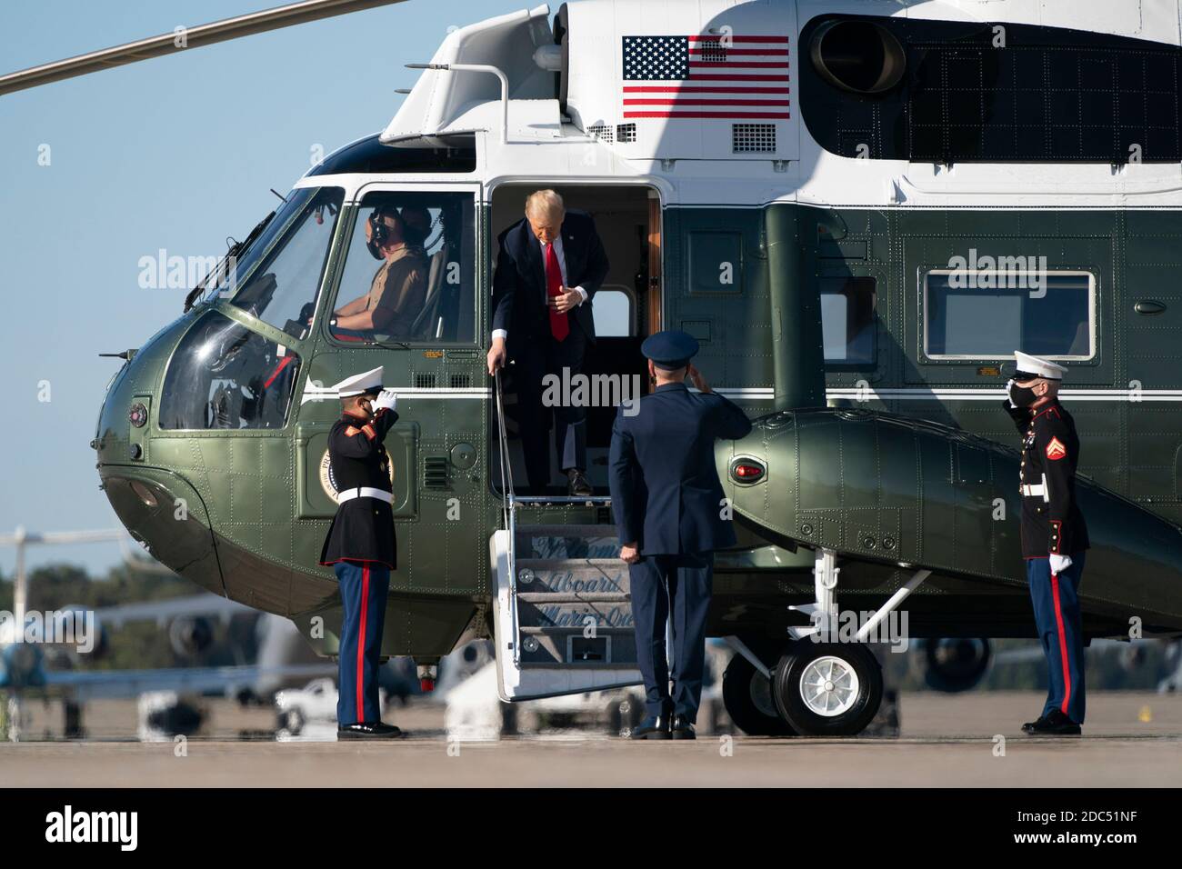 US President Donald Trump exits Marine One as he boards Air Force One on October 14, 2020 at Joint Base Andrews in Maryland. Trump is scheduled to fly to Des Moines, Iowa for a Make America Great campaign rally before returning to the White House tonight. Credit: Alex Edelman/The Photo Access Stock Photo