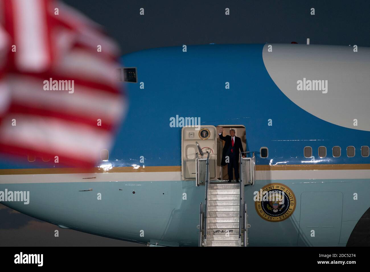US President Donald Trump arrives at a Make America Great Again campaign event at Des Moines International Airport on October 14, 2020 in Des Moines, Iowa. Trump campaigns a week after recovering from COVID-19. Credit: Alex Edelman/The Photo Access Stock Photo