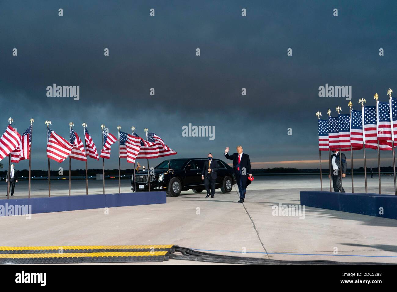 US President Donald Trump arrives at a Make America Great Again campaign event at Des Moines International Airport on October 14, 2020 in Des Moines, Iowa. Trump campaigns a week after recovering from COVID-19. Credit: Alex Edelman/The Photo Access Stock Photo
