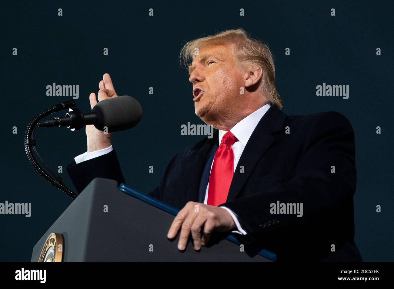 US President Donald Trump speaks during a Make America Great Again campaign event at Des Moines International Airport on October 14, 2020 in Des Moines, Iowa. Trump campaigns a week after recovering from COVID-19. Credit: Alex Edelman/The Photo Access Stock Photo