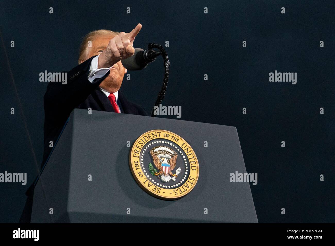 US President Donald Trump speaks during a Make America Great Again campaign event at Des Moines International Airport on October 14, 2020 in Des Moines, Iowa. Trump campaigns a week after recovering from COVID-19. Credit: Alex Edelman/The Photo Access Stock Photo
