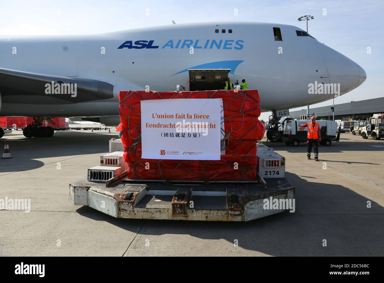 Brussels, Belgium. 16th Mar, 2020. Chinese medical supplies for Belgium are unloaded at the Liege Airport in Liege, Belgium, on March 16, 2020. TO GO WITH Spotlight: China's 'Air Silk Road' demonstrates huge potential Credit: Zhang Cheng/Xinhua/Alamy Live News Stock Photo