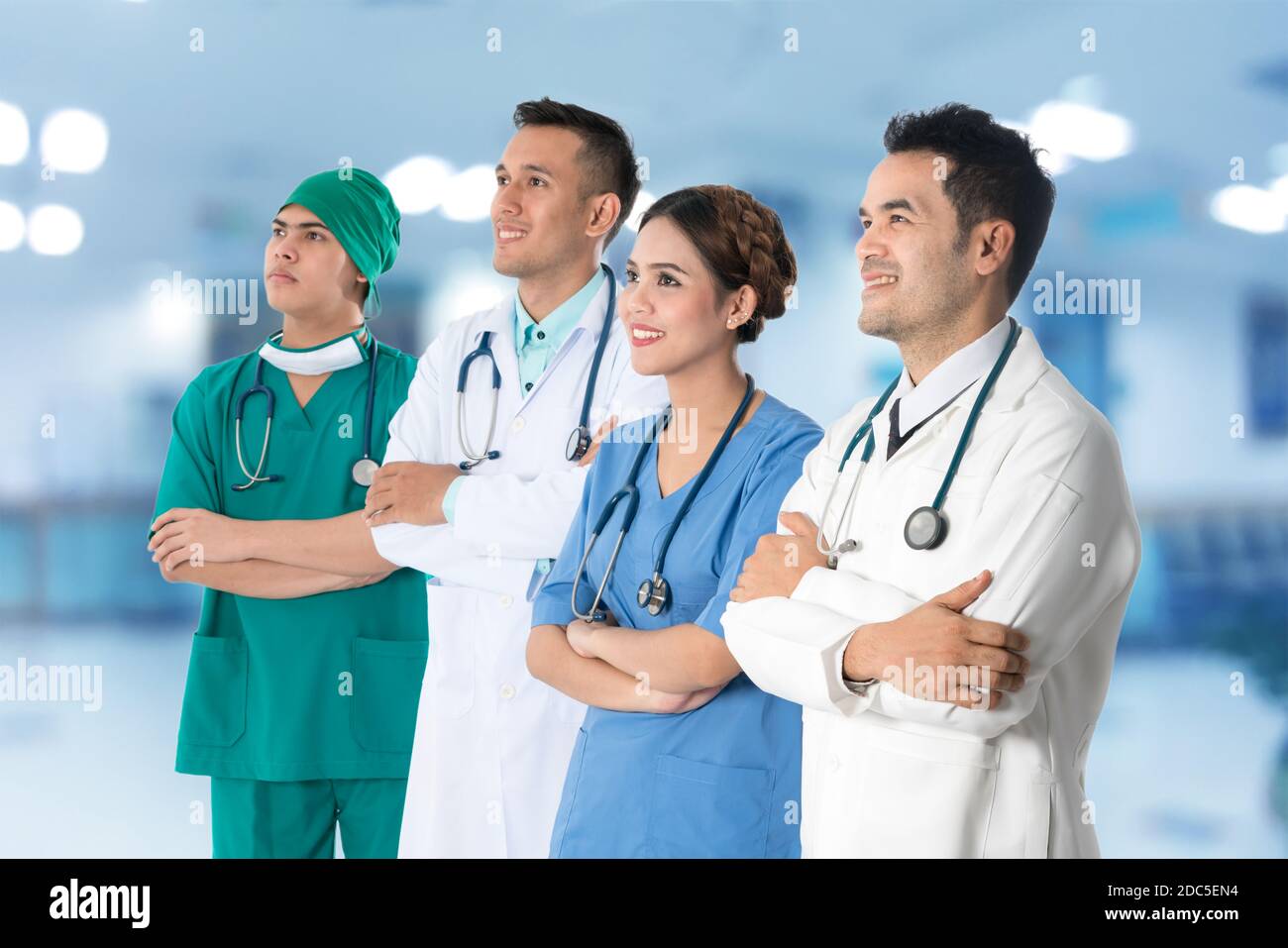Doctors group including surgeon, nurse and doctor wearing uniform and
