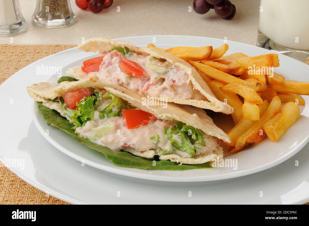A tuna sandwich on pita bread with french fries Stock Photo Alamy