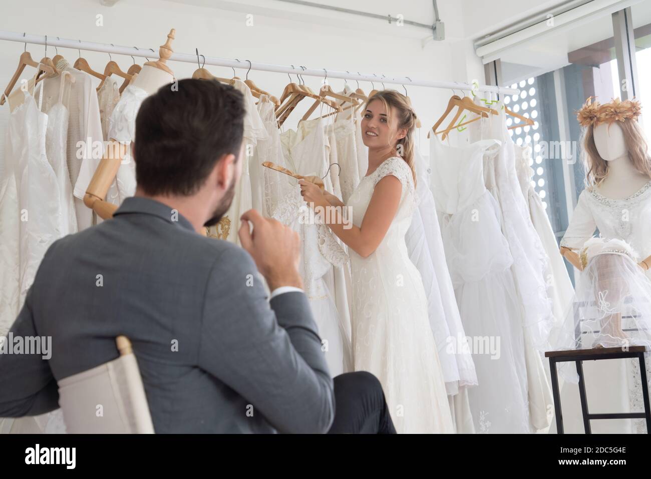 Happy bride and groom in wedding dress prepare for married in wedding
