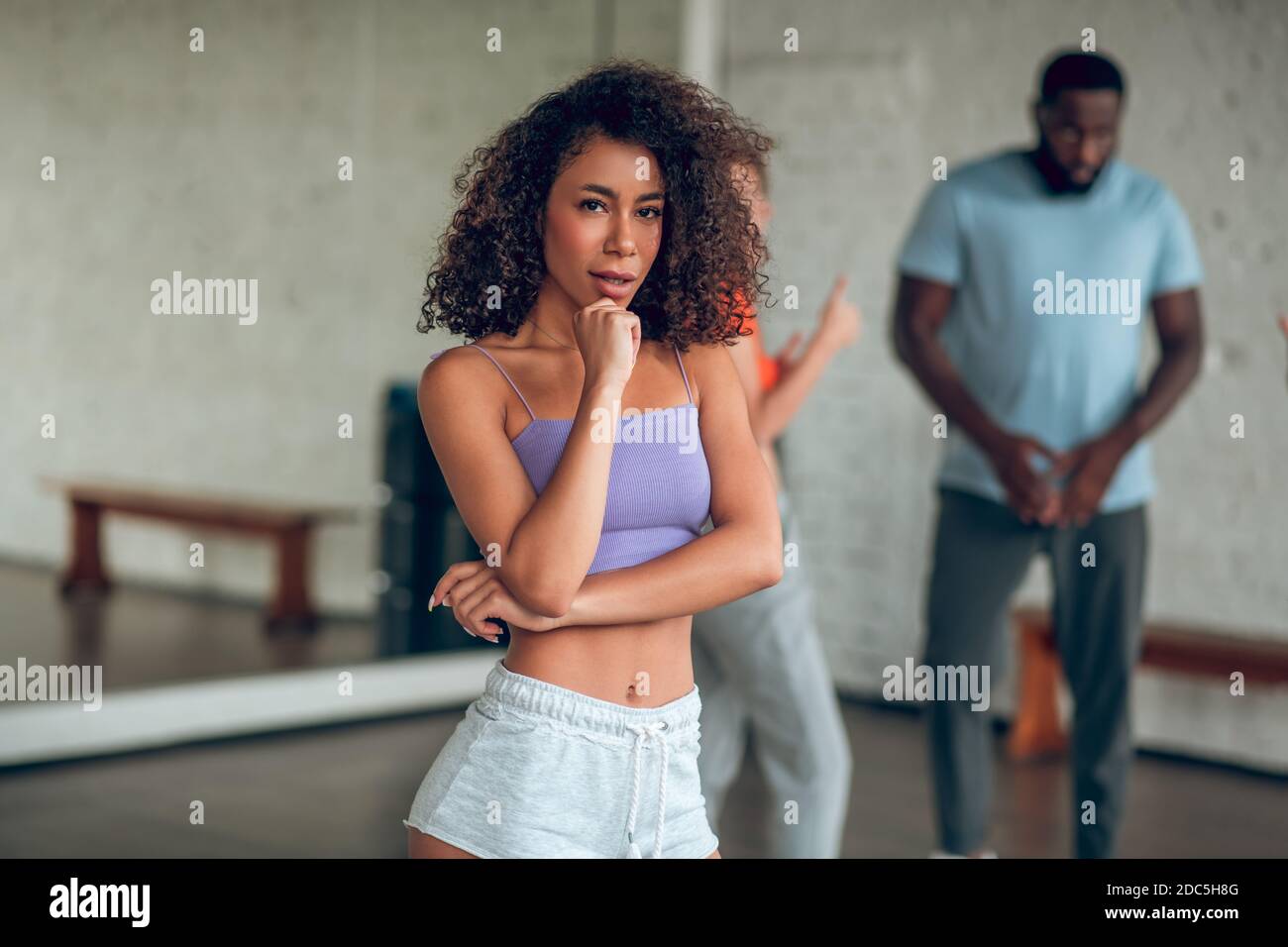 Thoughtful dancer is figuring out on a new choreography Stock Photo