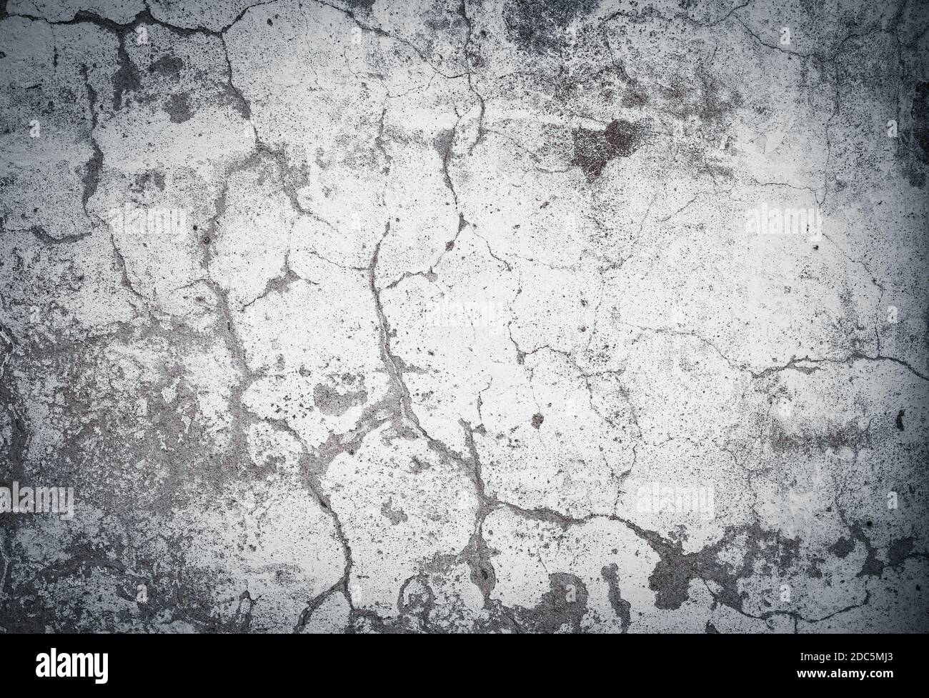 Old cracked concrete wall texture. Weathered background. Stock Photo