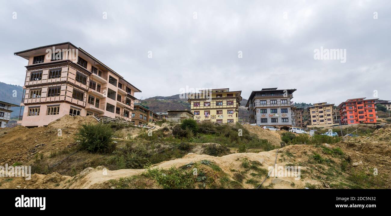 Traditional housing apartments in outskirts of city in Bhutan. Stock Photo