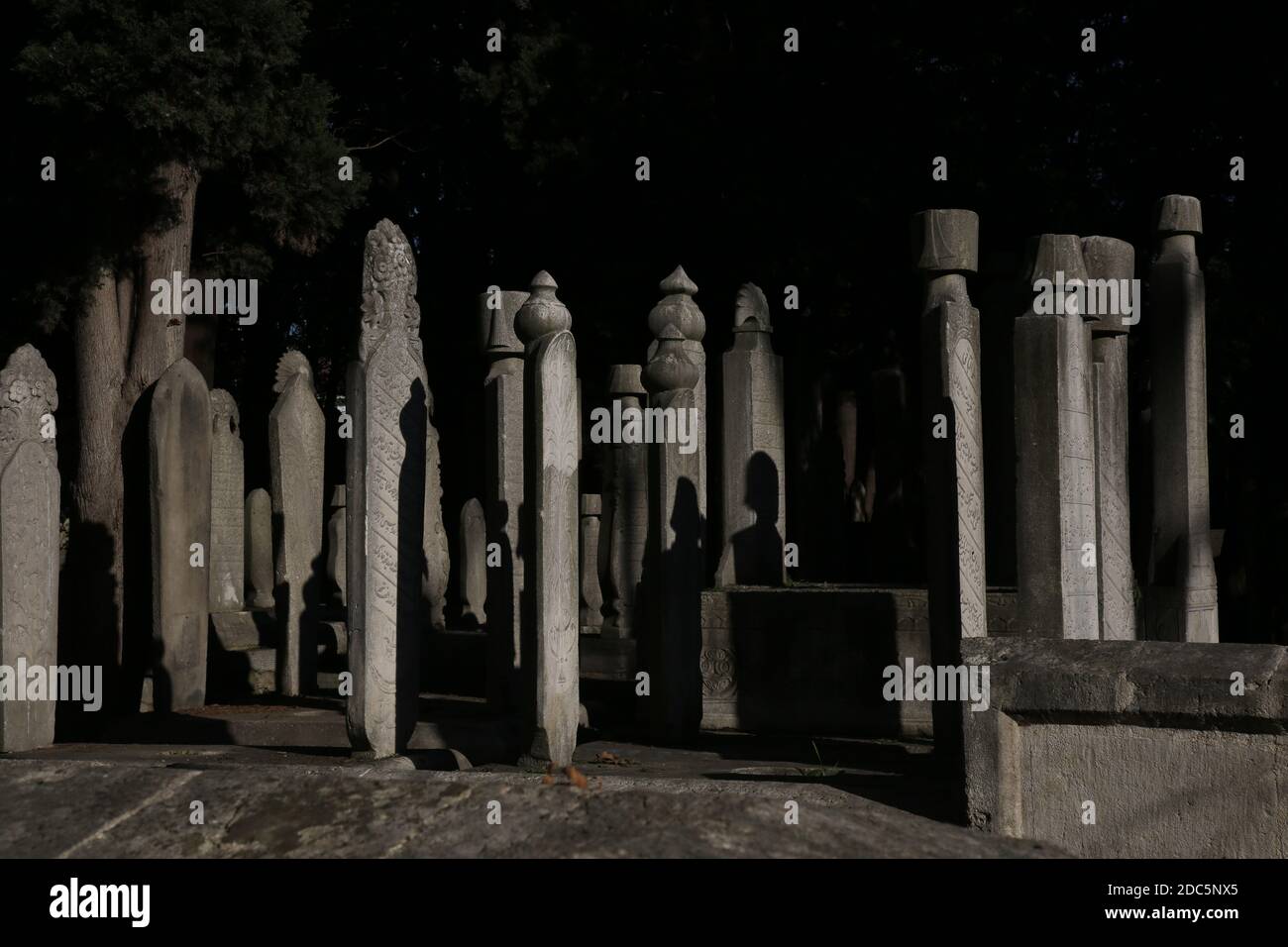The Ottoman historic old tombstones in the Eyup cemetery, Istanbul, Turkey. Historic headstone in istanbul Stock Photo