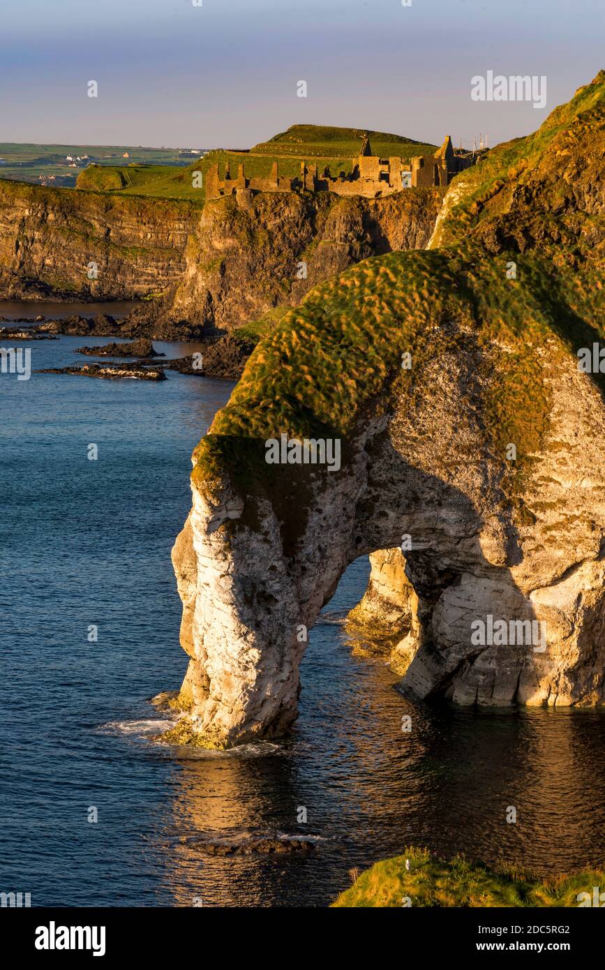 The White Rocks and Dunluce Castle Causeway Coast, Co. Antrim, Northern Ireland Stock Photo