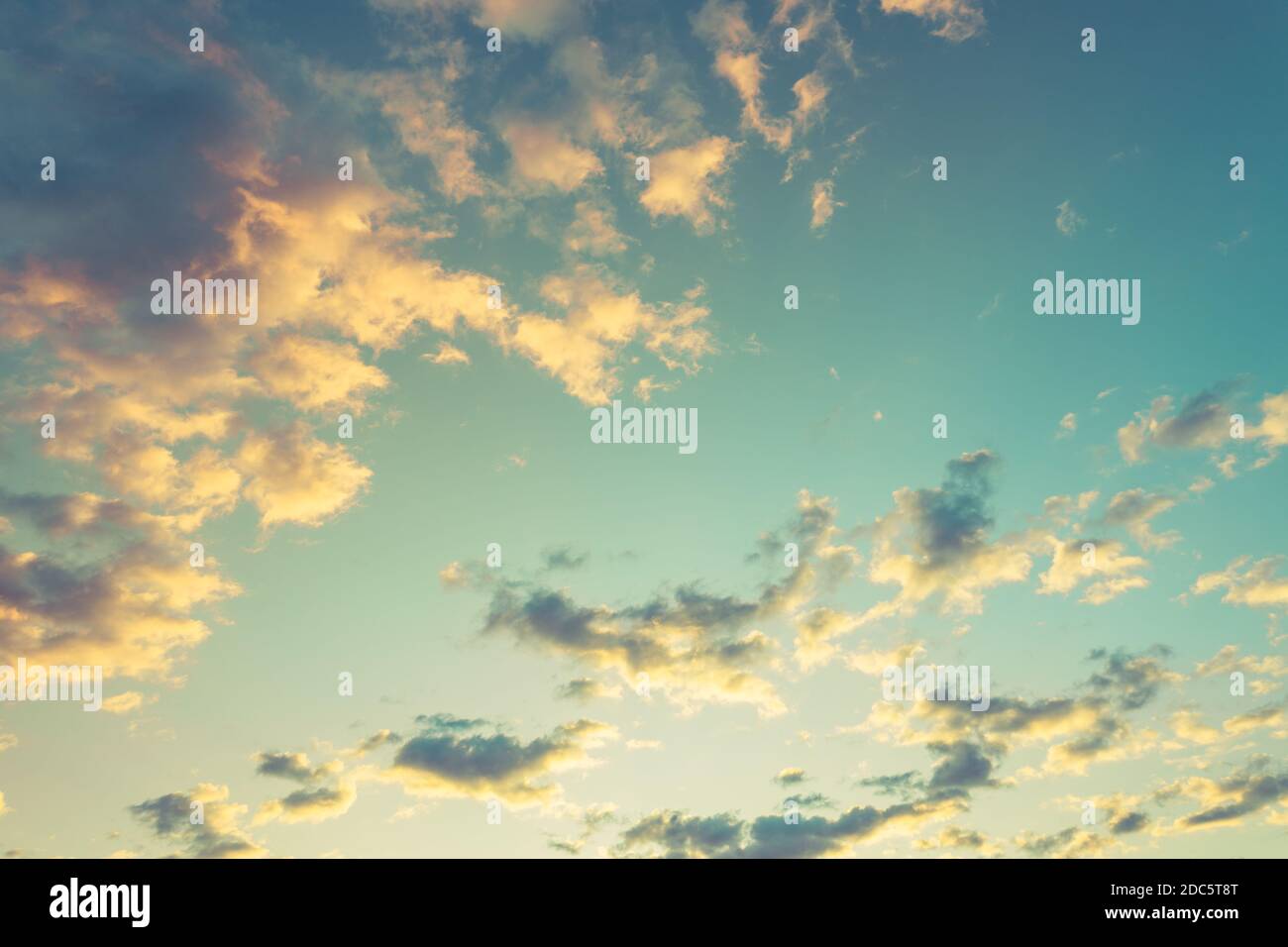 Sky with clouds and sun. Romantic skyscape, summer sky clouds, sunset colors. Dream weather, positive vibes, meditation Stock Photo