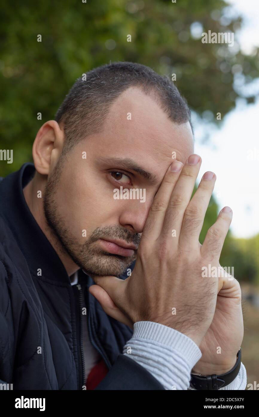Serious young man hi-res stock photography and images - Alamy