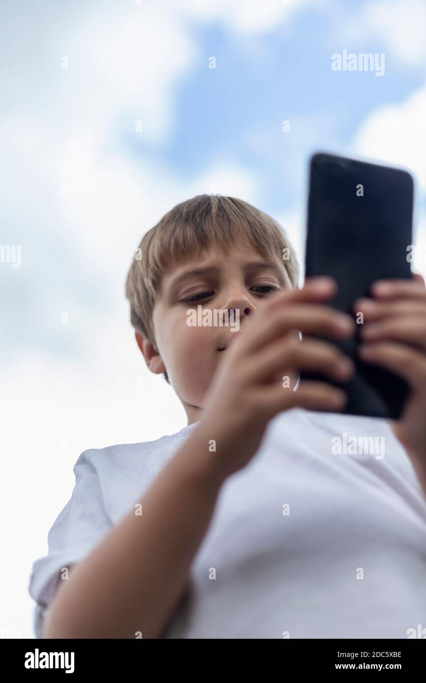 Boy video game low angle hi-res stock photography and images - Alamy