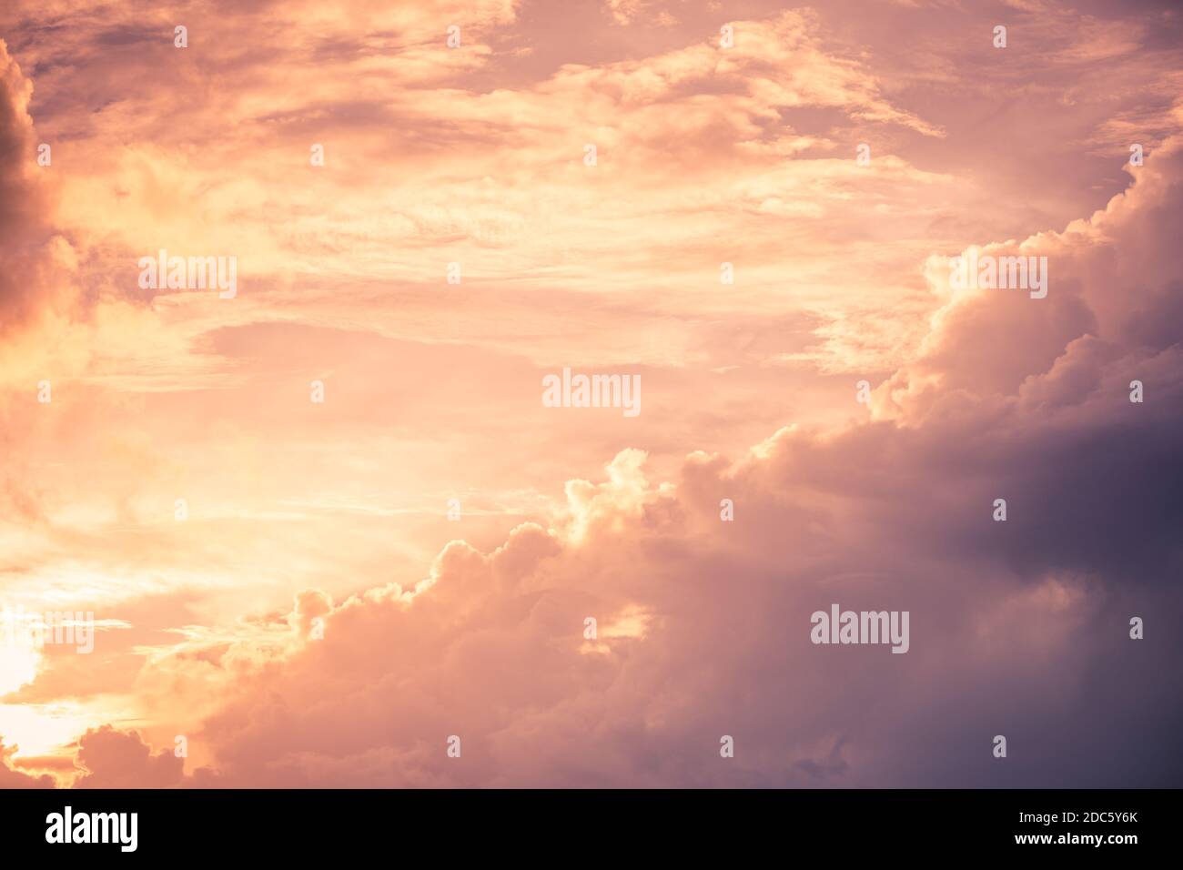 Beautiful sky with cloud before sunset. Sunset dramatic sky clouds with sunbeam Stock Photo