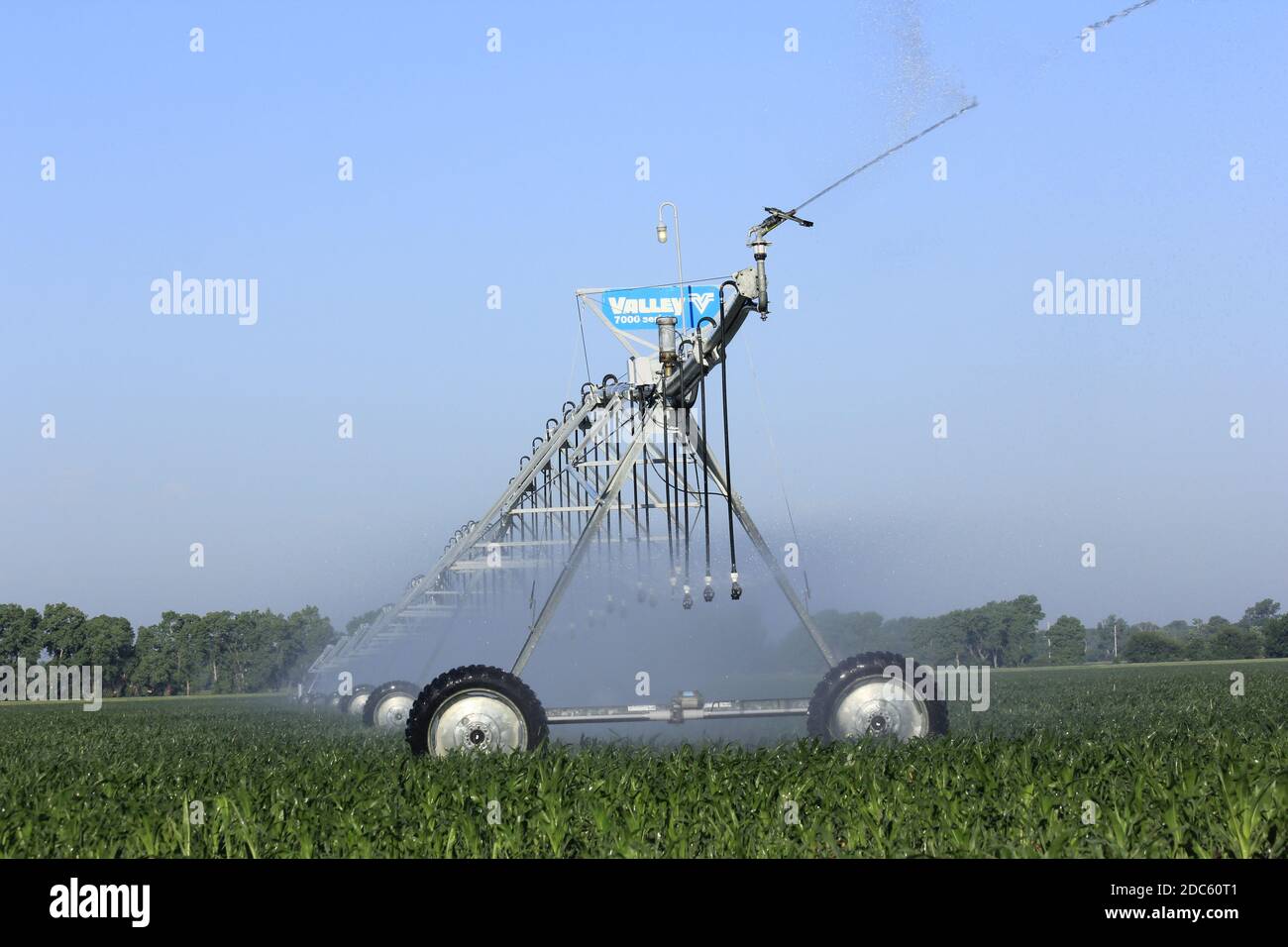 Valley Irrigation system in a farm field watering the crop in the