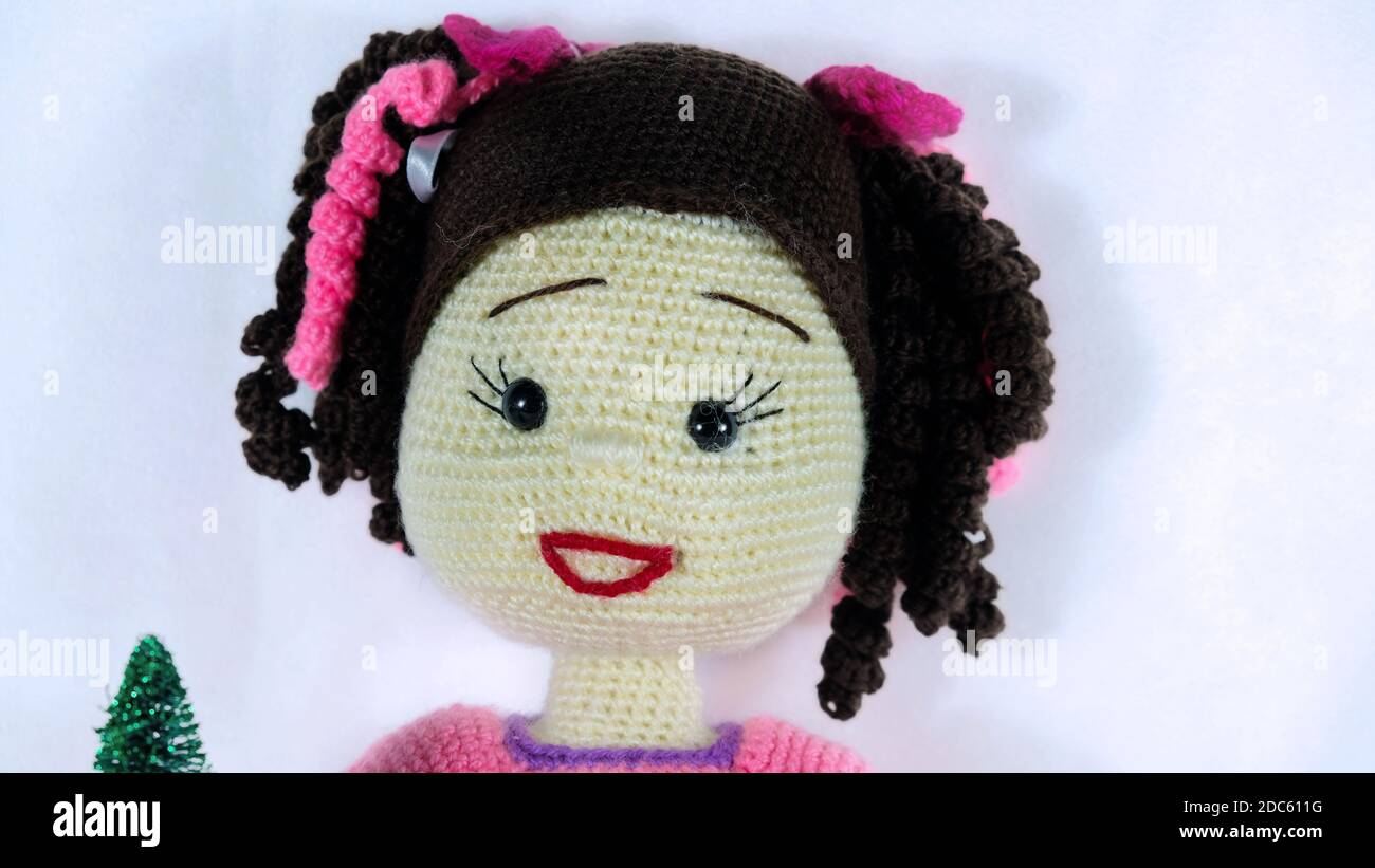 Crochet doll with curly hair Stock Photo