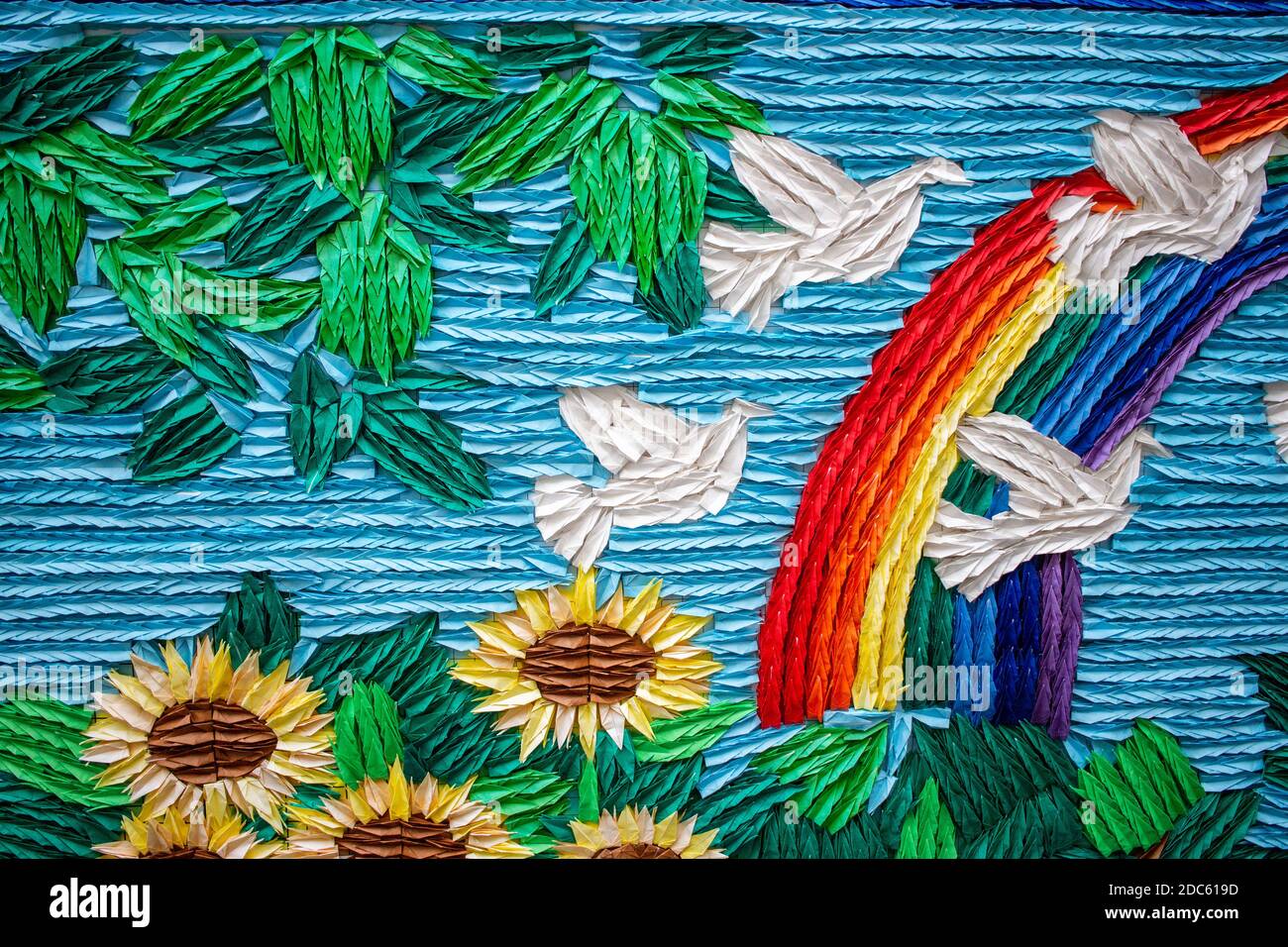 Colourful origami paper cranes arranged into a 'peace' design at Nagasaki Atomic Bomb Museum Stock Photo