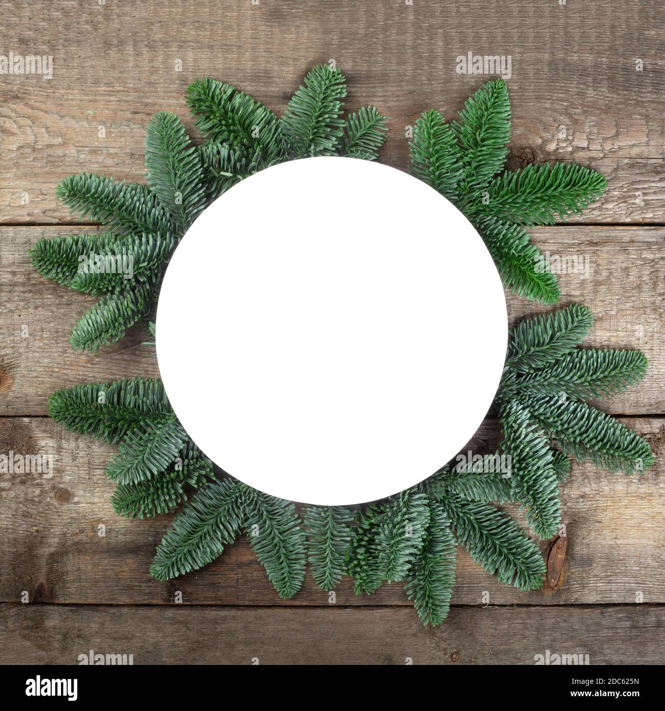 Christmas circle frame of natural fir tree branches with copy space for ...