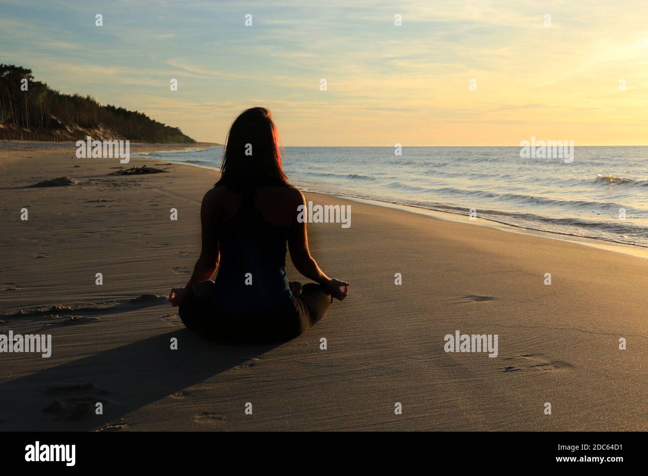 Yoga and meditation on the beach Stock Photo - Alamy