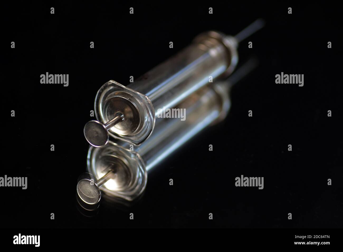 Glass syringe for injection in hospital Stock Photo