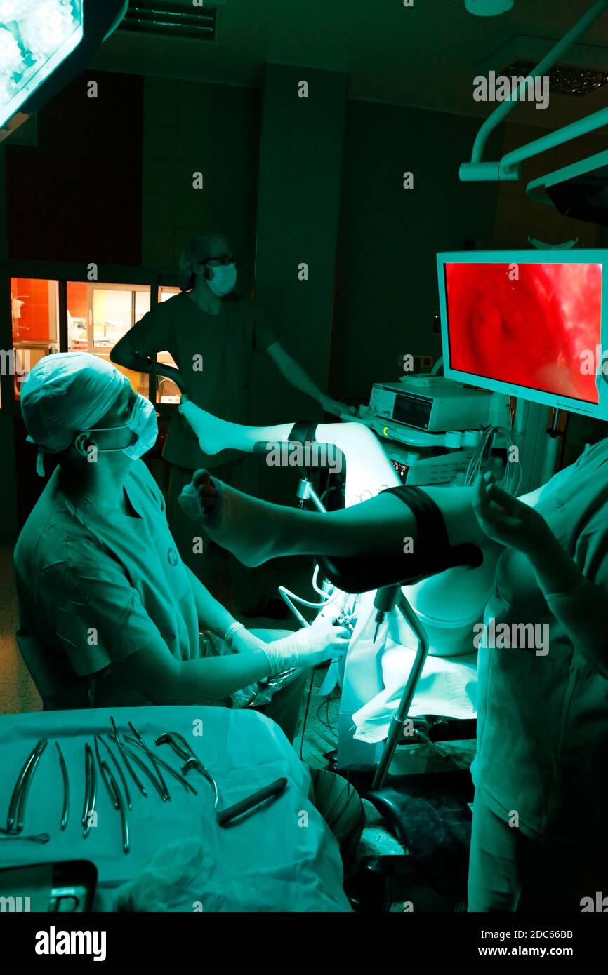 gynecologist during laparoscopic surgery in the operating room of a hospital Stock Photo