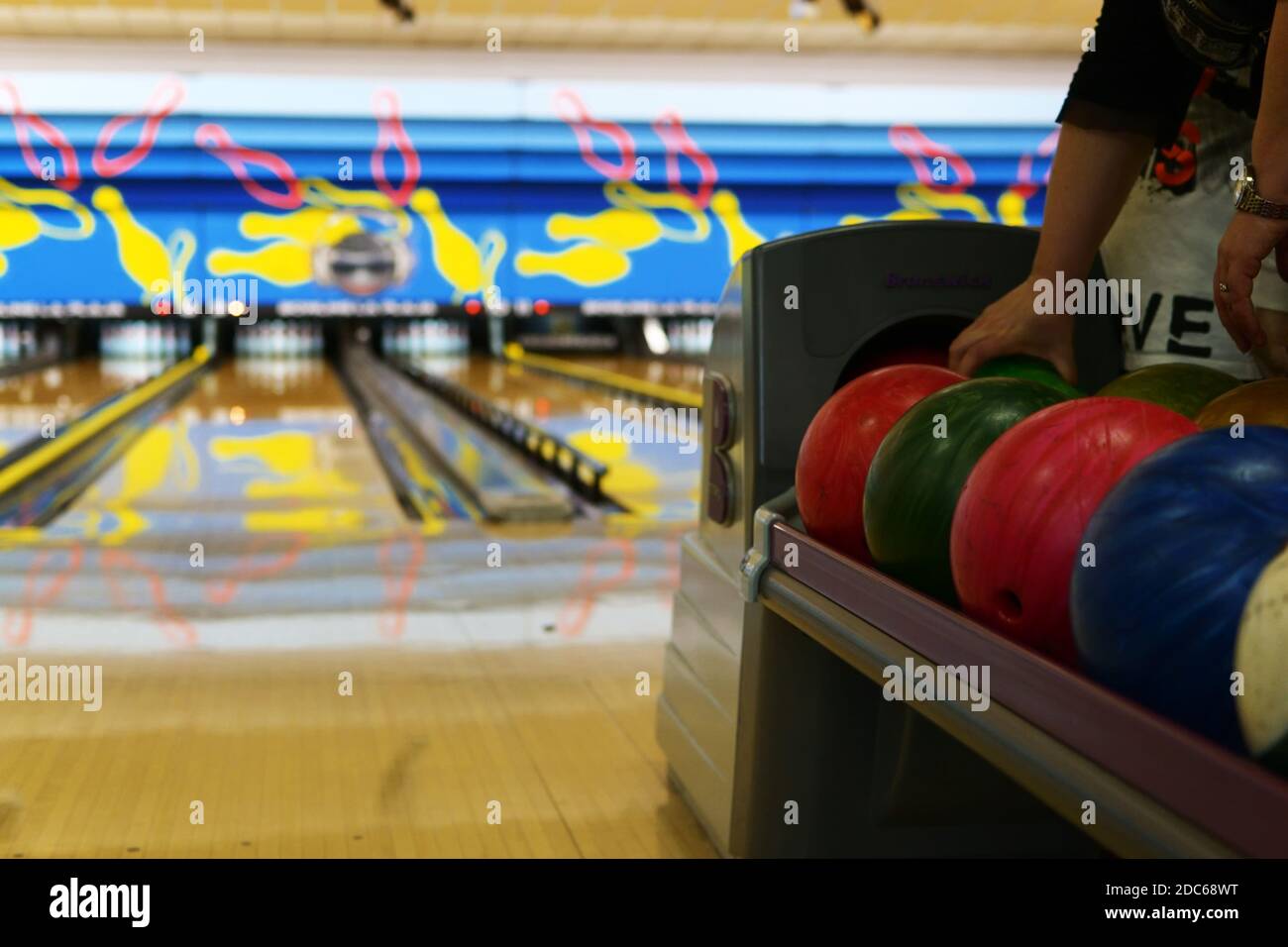 colored bowling balls.Bowling alley.Generic bowling alleys Stock Photo