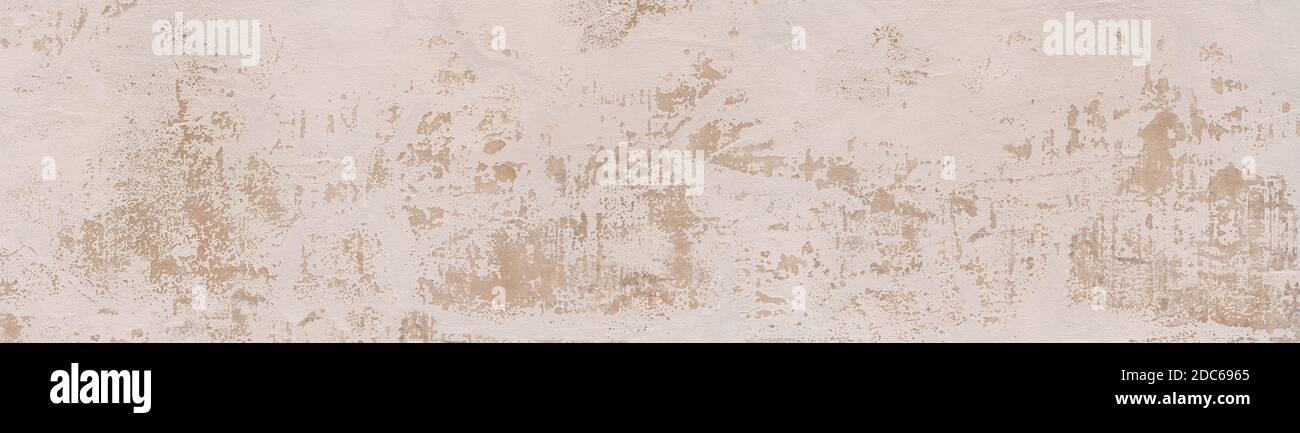 Bright panoramic wall texture with weathered plaster Stock Photo