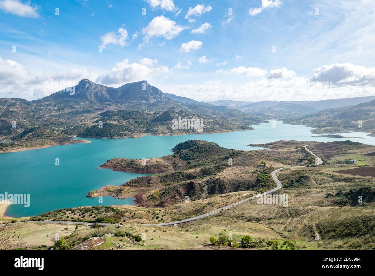 a landscape view of the lake and hills surrounding Zahara de la Sierra ...