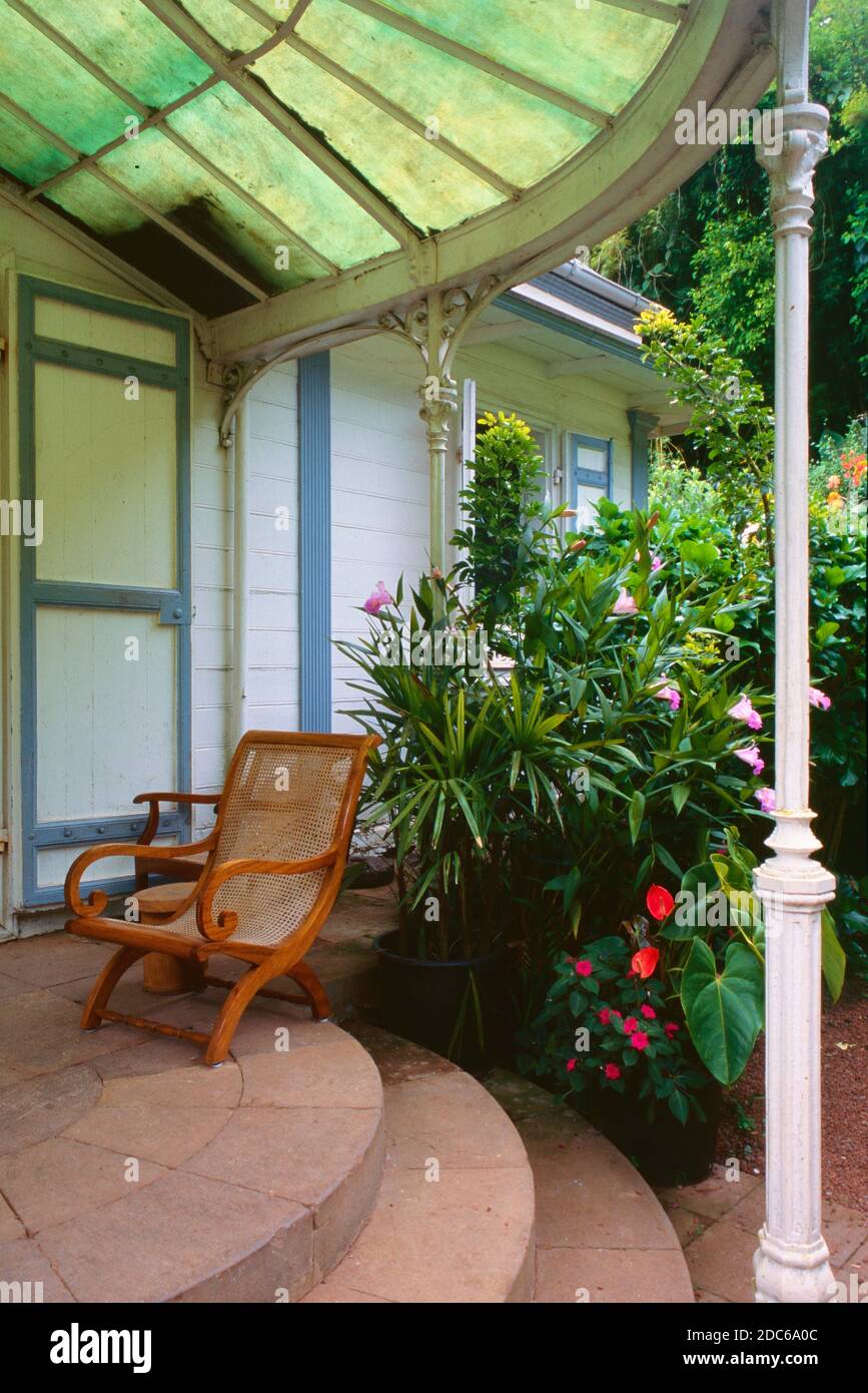 Planters Chair on Veranda or Verandah of the the mid-c19th Villa Folio at Hell-Bourg La Réunion or Reunion island France Stock Photo