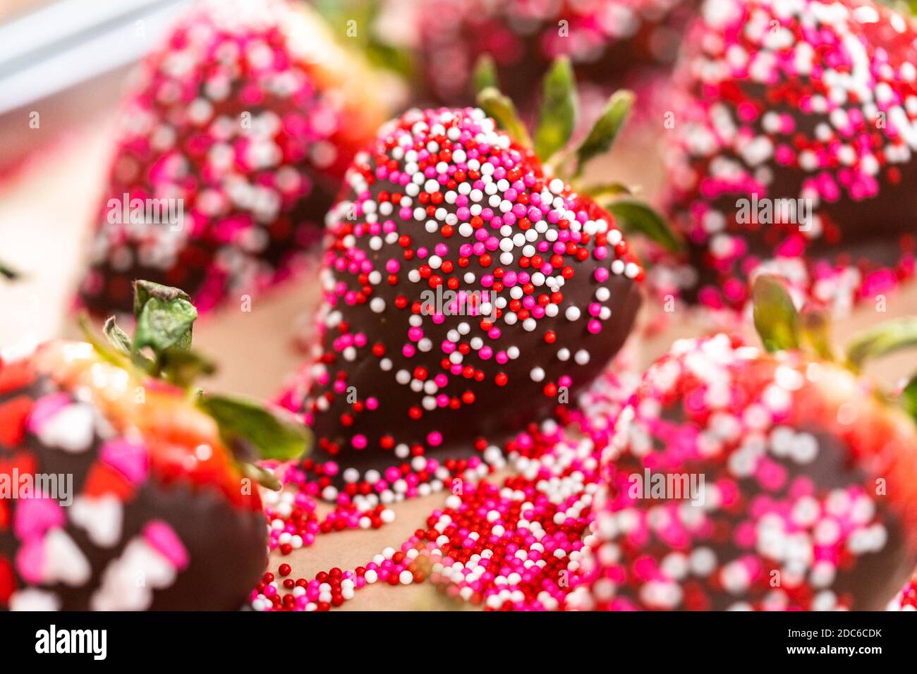 Chocolate dipped strawberries covered with sprinkles Stock Photo Alamy