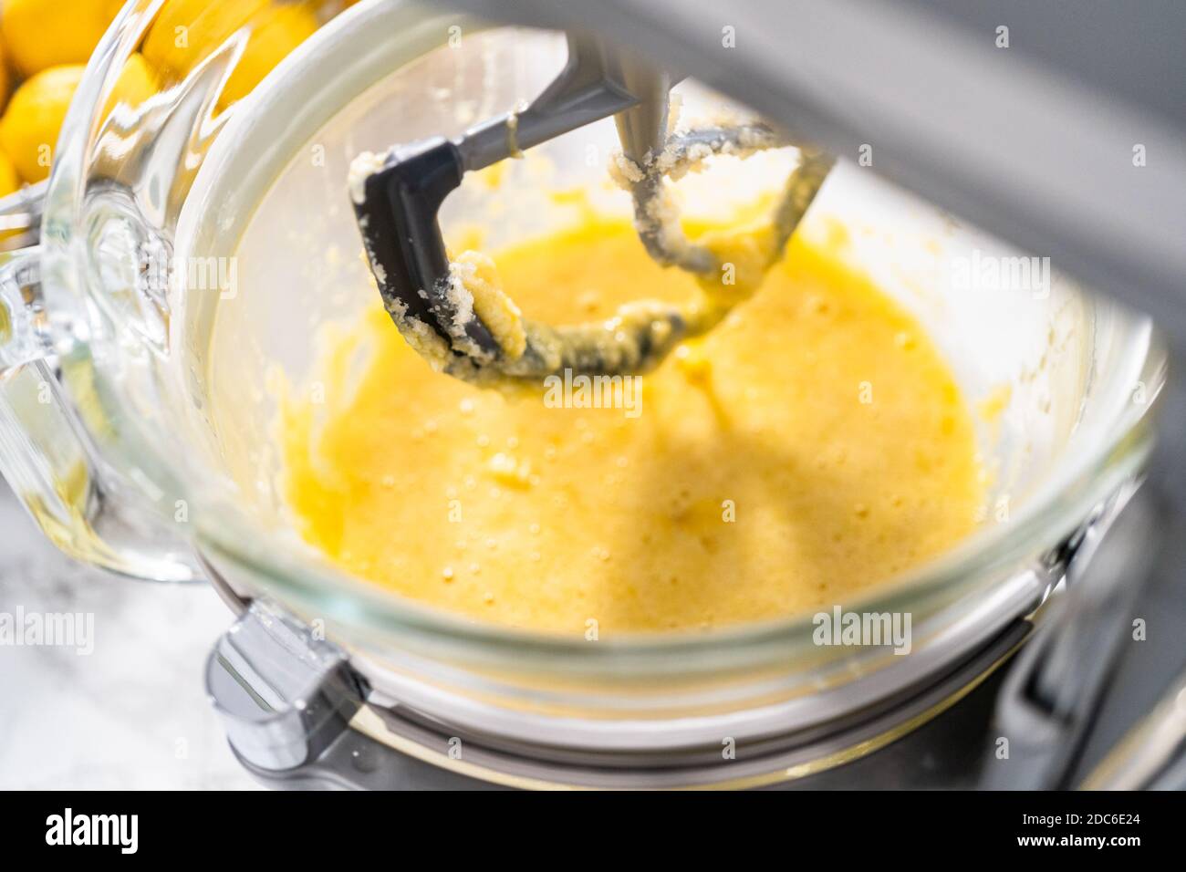 Mixing ingredients into the batter for lemon pound cake Stock Photo - Alamy