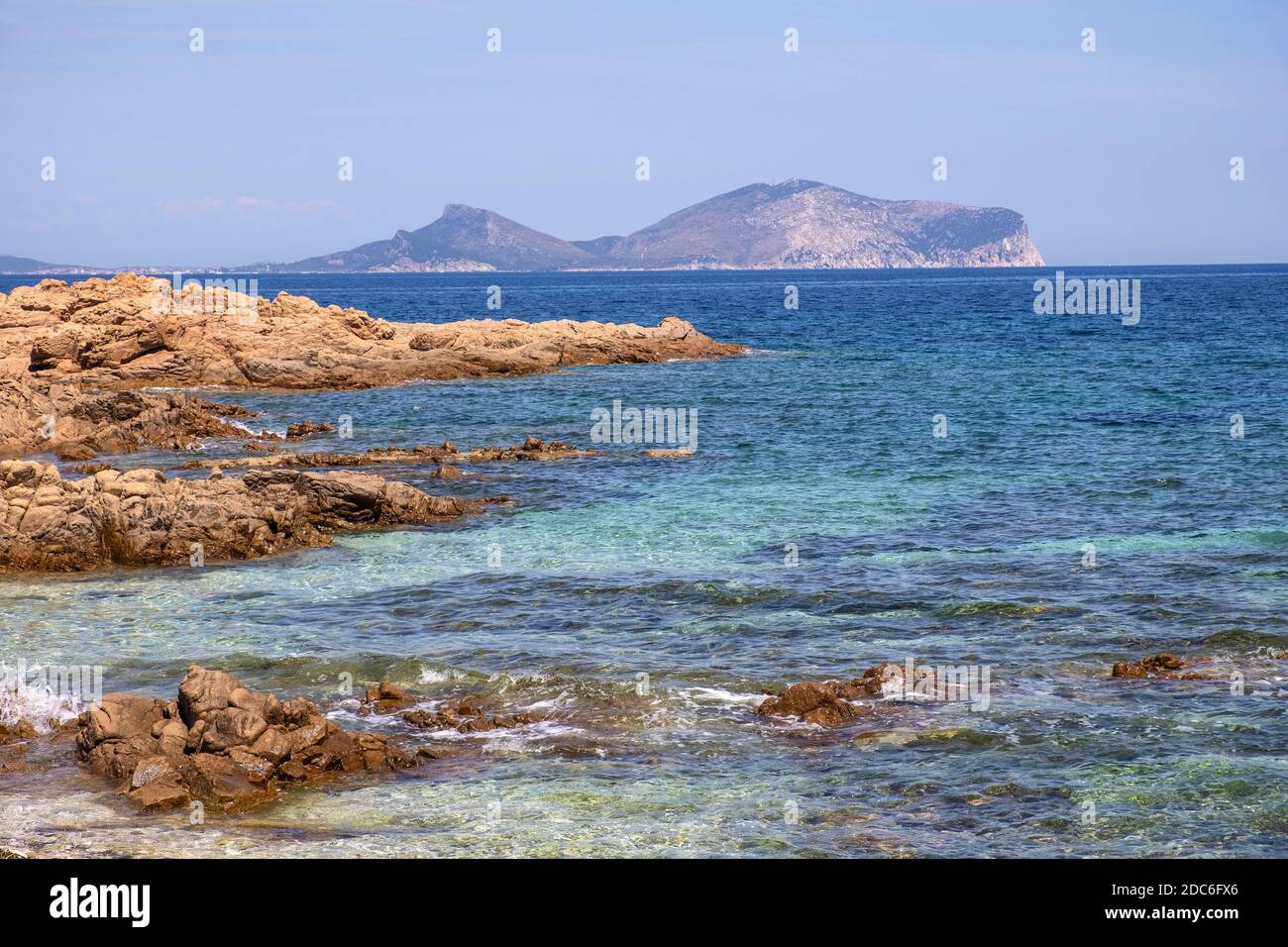 Marine Protected Area natural reserve with seashore rocks of Isola Tavolara island on Tyrrhenian Sea with Capo Figari cape, Monte Ruju peak and Golfo Stock Photo