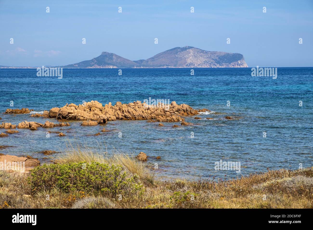 Marine Protected Area natural reserve with seashore rocks of Isola Tavolara island on Tyrrhenian Sea with Capo Figari cape, Monte Ruju peak and Golfo Stock Photo