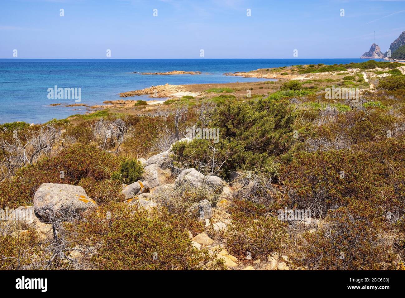 Panoramic view of Spalmatore di Terra peninsula of Marine Protected Area natural reserve with Mediterranean scrub of Isola Tavolara island on Tyrrheni Stock Photo