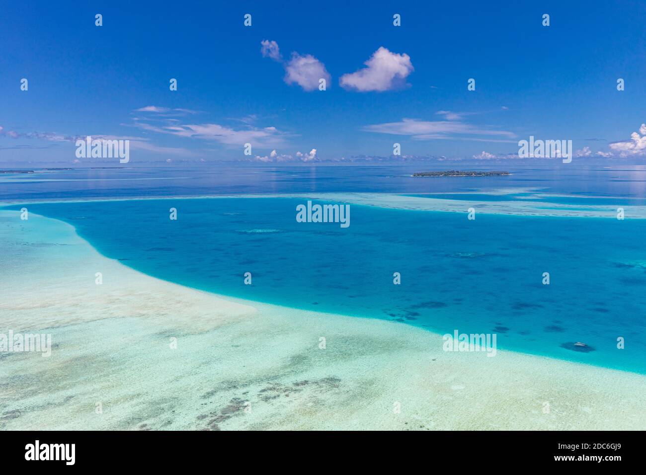 Aerial view on tropical islands. Maldives island, coral reef, picturesque nature landscape, seascape. Amazingly beautiful aerial drone view Stock Photo