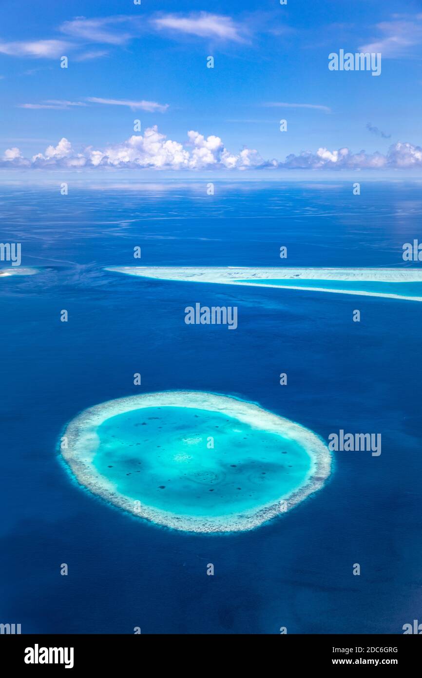Aerial view on tropical islands. Maldives island, coral reef, picturesque nature landscape, seascape. Amazingly beautiful aerial drone view Stock Photo