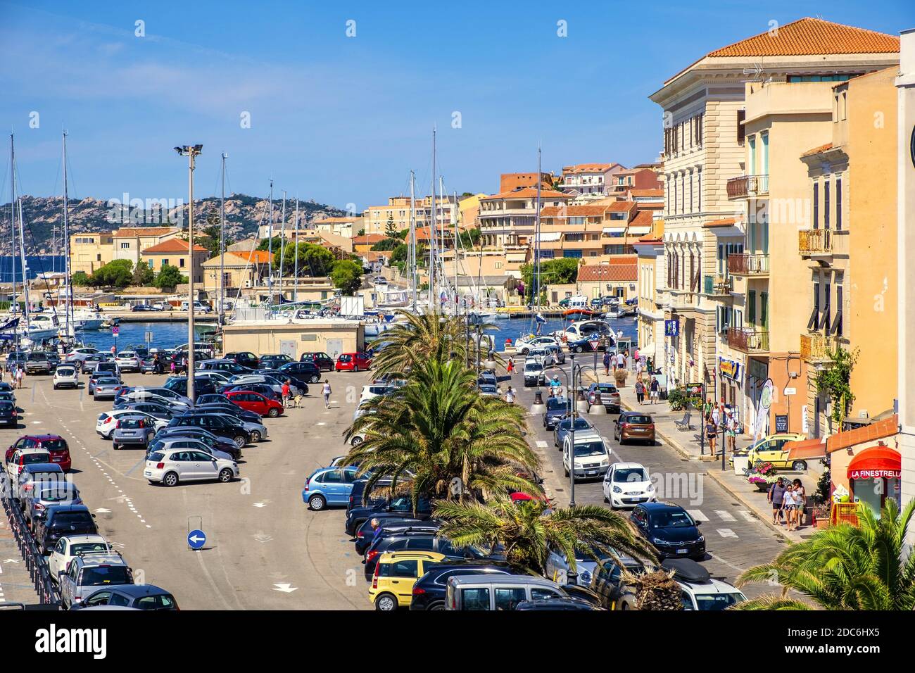 La Maddalena, Sardinia / Italy - 2019/07/17: Panoramic view of La Maddalena port quarter - Porto di Cala Gavetta - at the Via Amendola street at the T Stock Photo