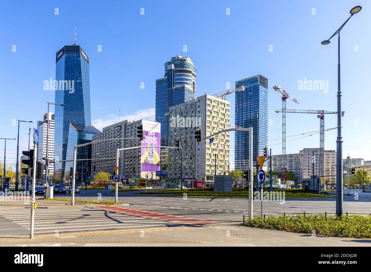 Warsaw, Mazovia / Poland - 2020/05/02: Panoramic view of Srodmiescie downtown district of Warsaw at Rondo ONZ roundabout with Q22, Cosmopolitan and Sp Stock Photo