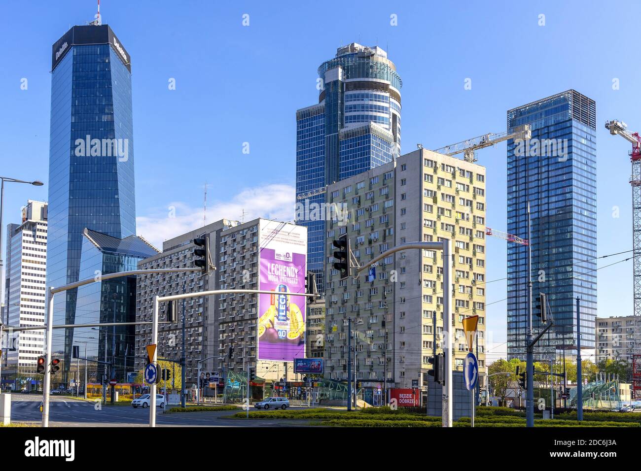 Warsaw, Mazovia / Poland - 2020/05/02: Panoramic view of Srodmiescie downtown district of Warsaw at Rondo ONZ roundabout with Q22, Cosmopolitan and Sp Stock Photo