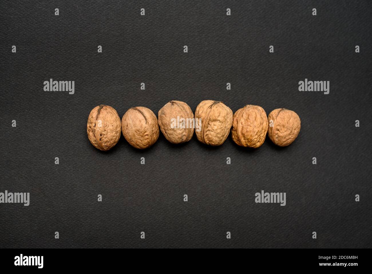 walnuts on a black background, macro Stock Photo